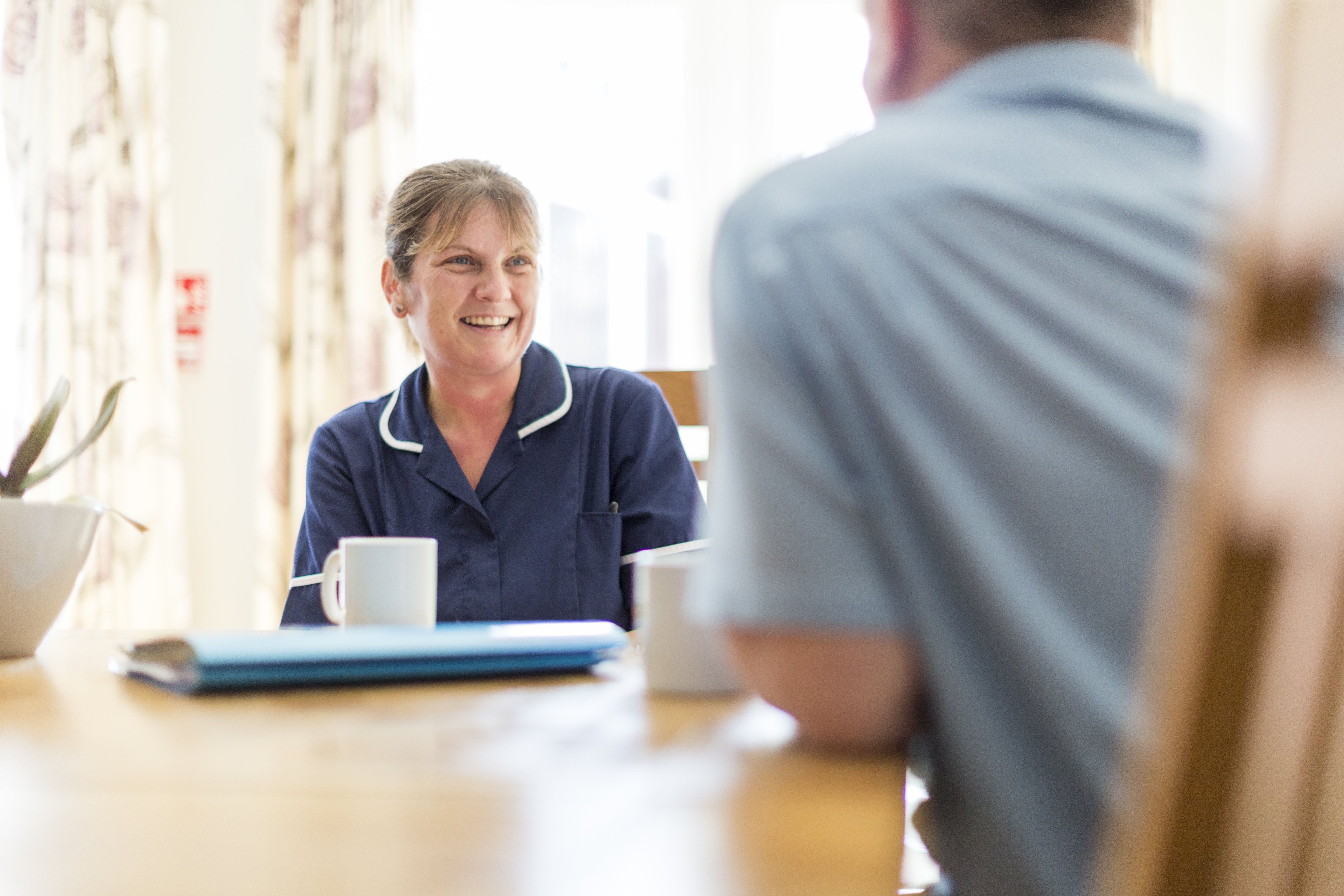 Nurse talking to patient