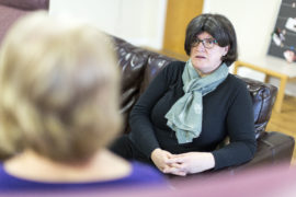 Staff member talking to someone