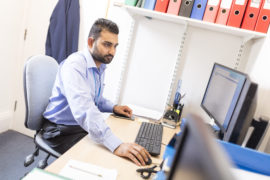 Male staff member in the office