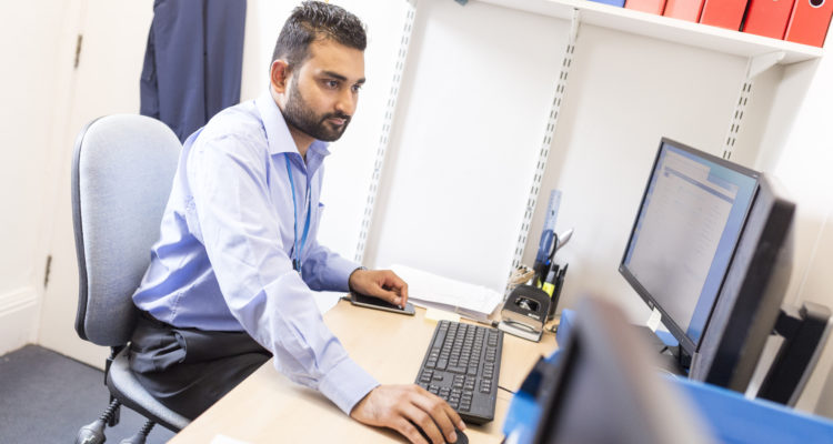 Male staff member in the office