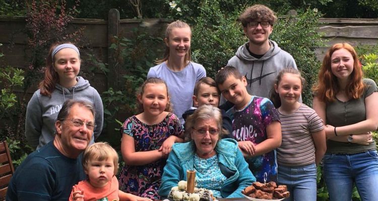 Kath and Brian Rogers with their grandchildren