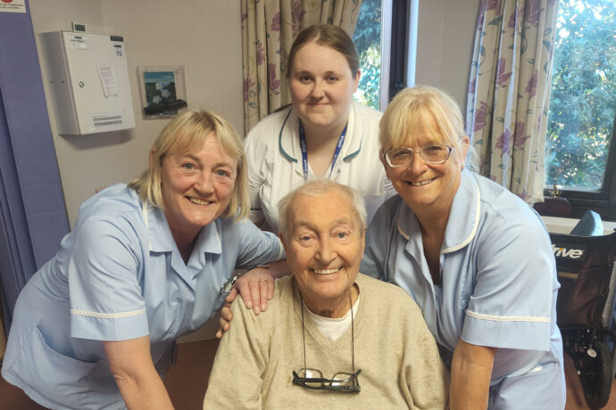 Staff at St Ann's Hospice, Heald Green Kay Madison, Megan Willington, Suzanne Willans with former inpatient John Webber