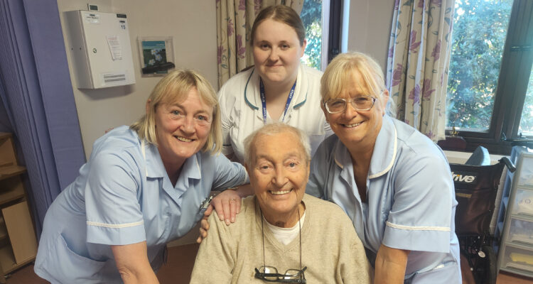 Staff at St Ann's Hospice, Heald Green Kay Madison, Megan Willington, Suzanne Willans with former inpatient John Webber